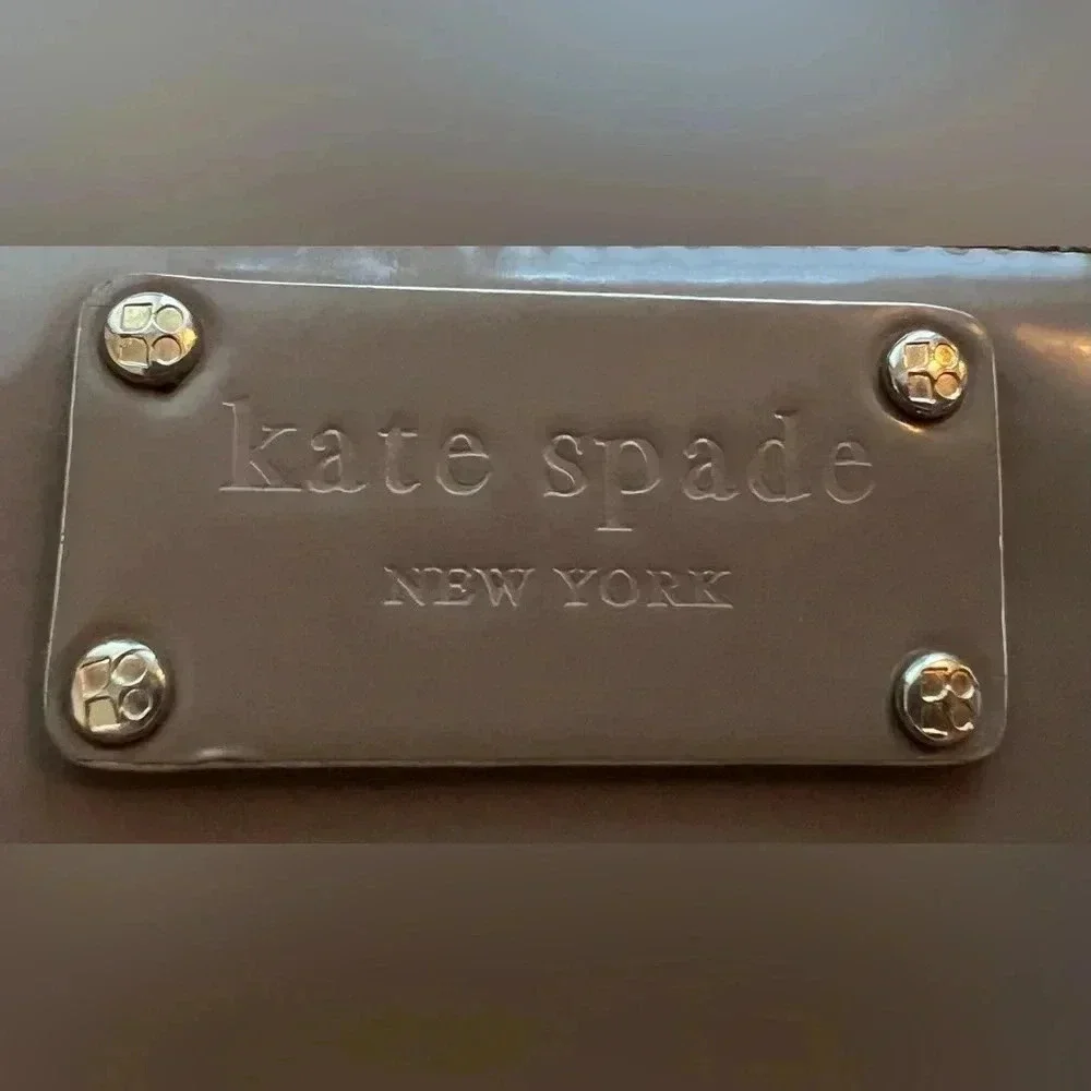 Kate Spade New York| ladies Continental patent leather zip around wallet.